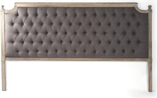 A headboard with leather upholstery. 