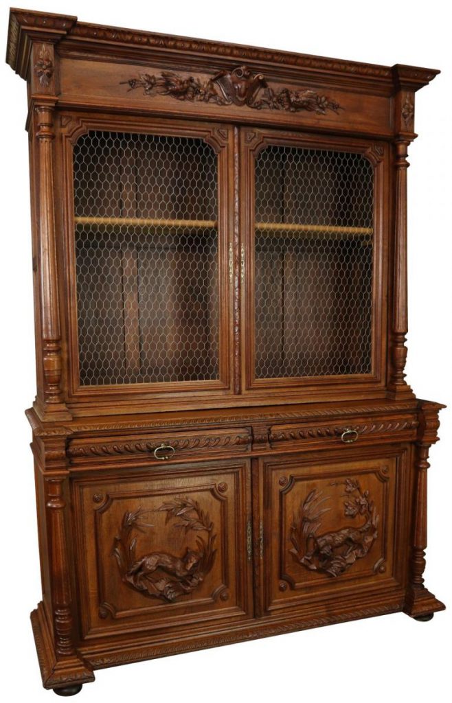 A tall, wooden Hunting style buffet